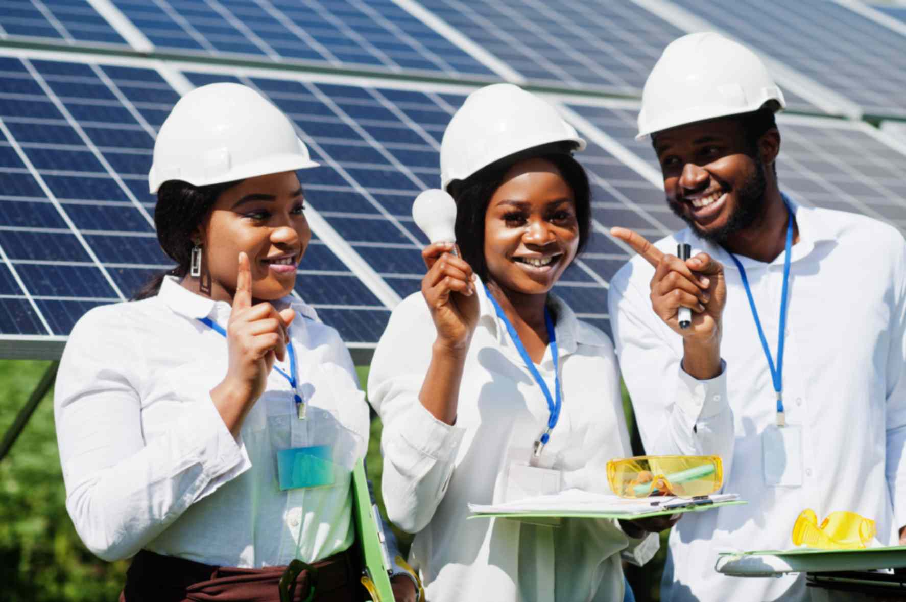 american-technician-checks-maintenance-solar-panels-group-three-black-engineers